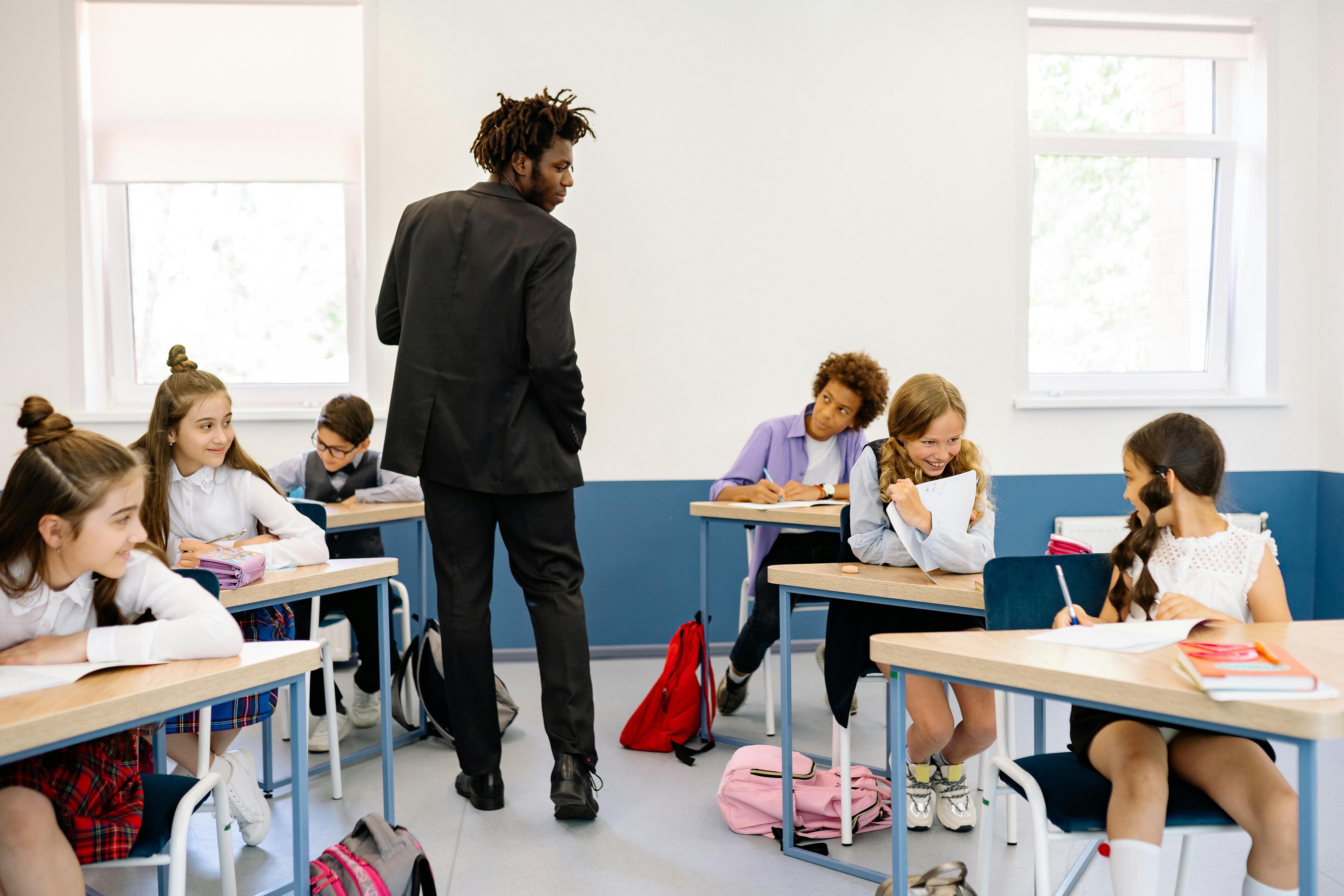 Teacher walking through classroom